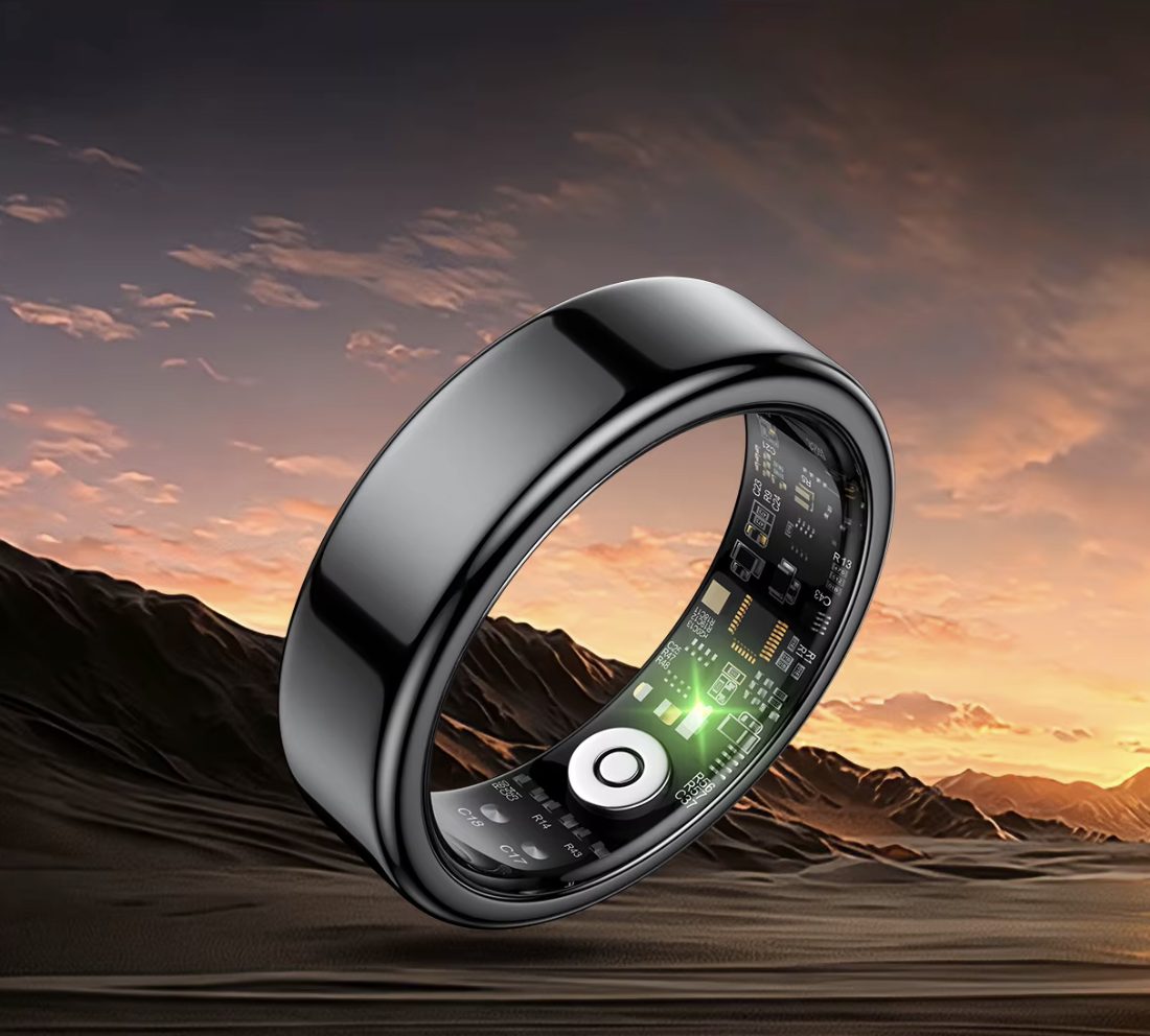 Kira AI Ring in Midnight Black standing in desert dunes at sunset